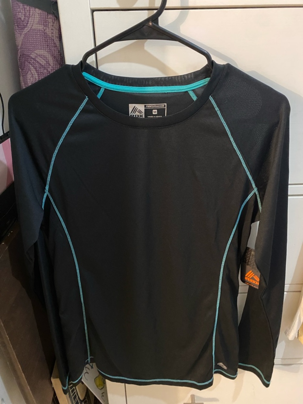 Reebok Black Long-Sleeve Performance Shirt with Teal Accents
